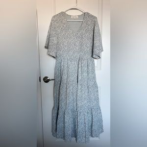 From boutique, “Called to Surf.” Bell sleeves and mid-calf. Smocked on bust.